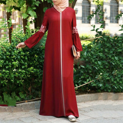 Elegant red floral abaya for women with full-length modest design, perfect for everyday wear or formal occasions.