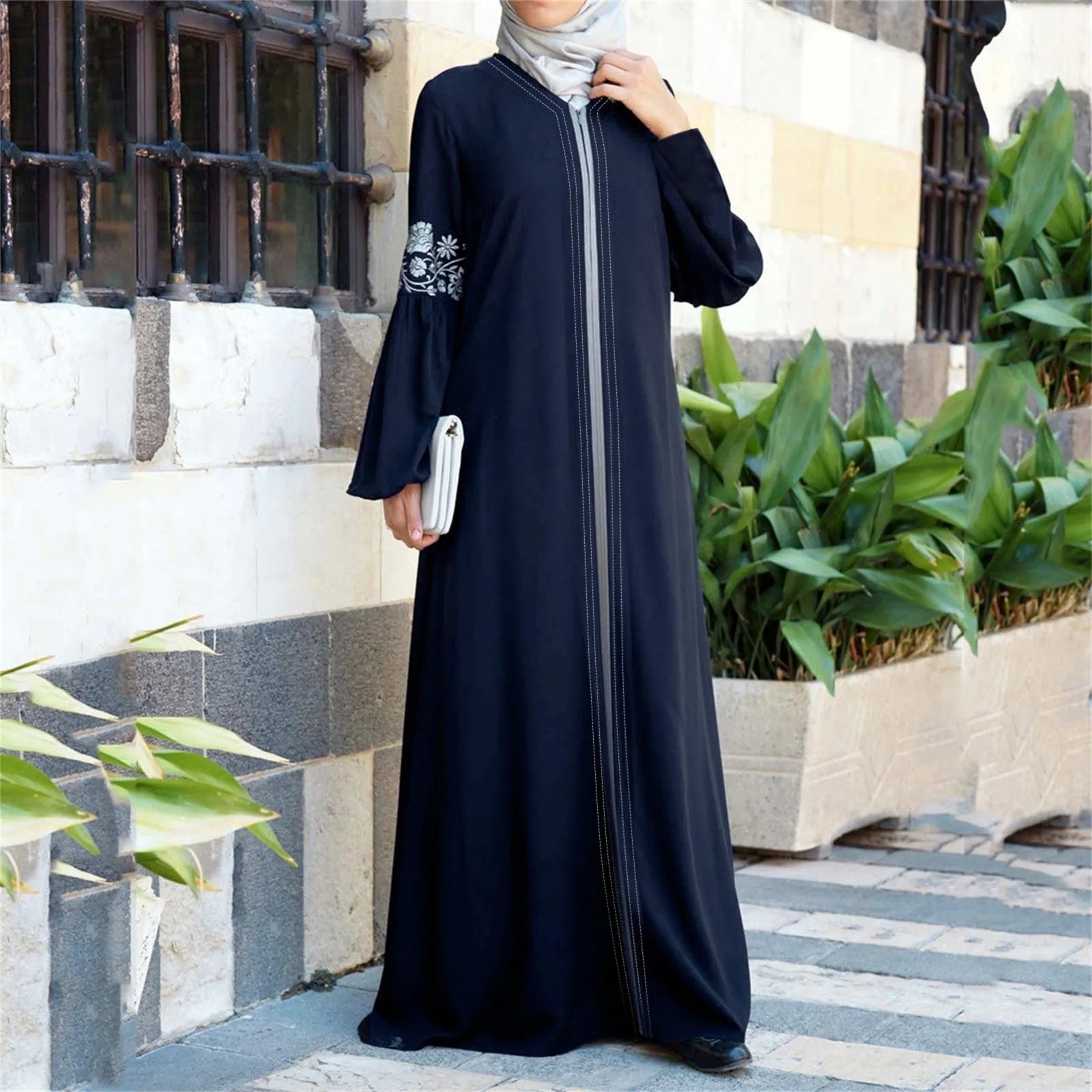 Elegant navy floral abaya for women with full-length modest design, perfect for everyday wear or formal occasions.